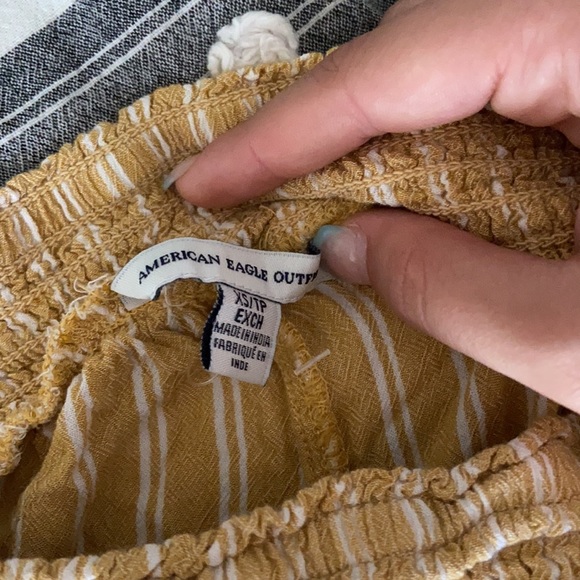 Yellow and White Flowy shorts. - Picture 2 of 2